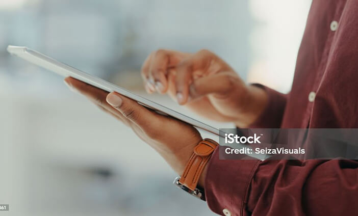 A person using a tablet device